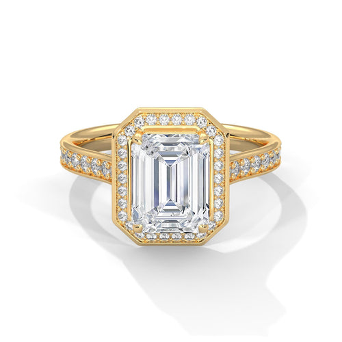 Emerald cut lab grown diamond halo cathedral ring with pavé band in yellow gold