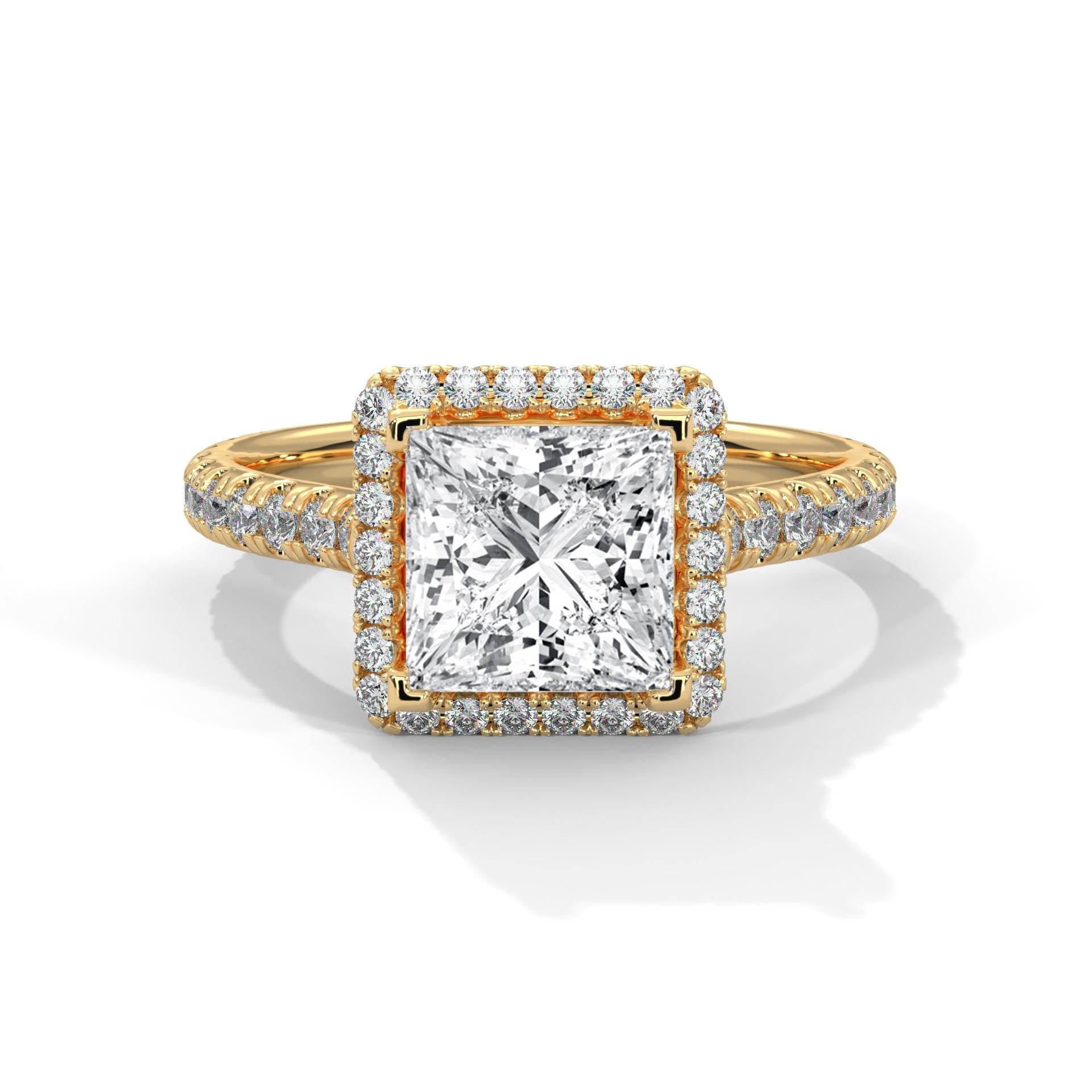 Colorless princess cut lab diamond halo cathedral ring in 14K yellow gold