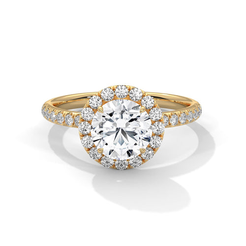 Colorless round cut lab diamond halo pave ring in yellow gold