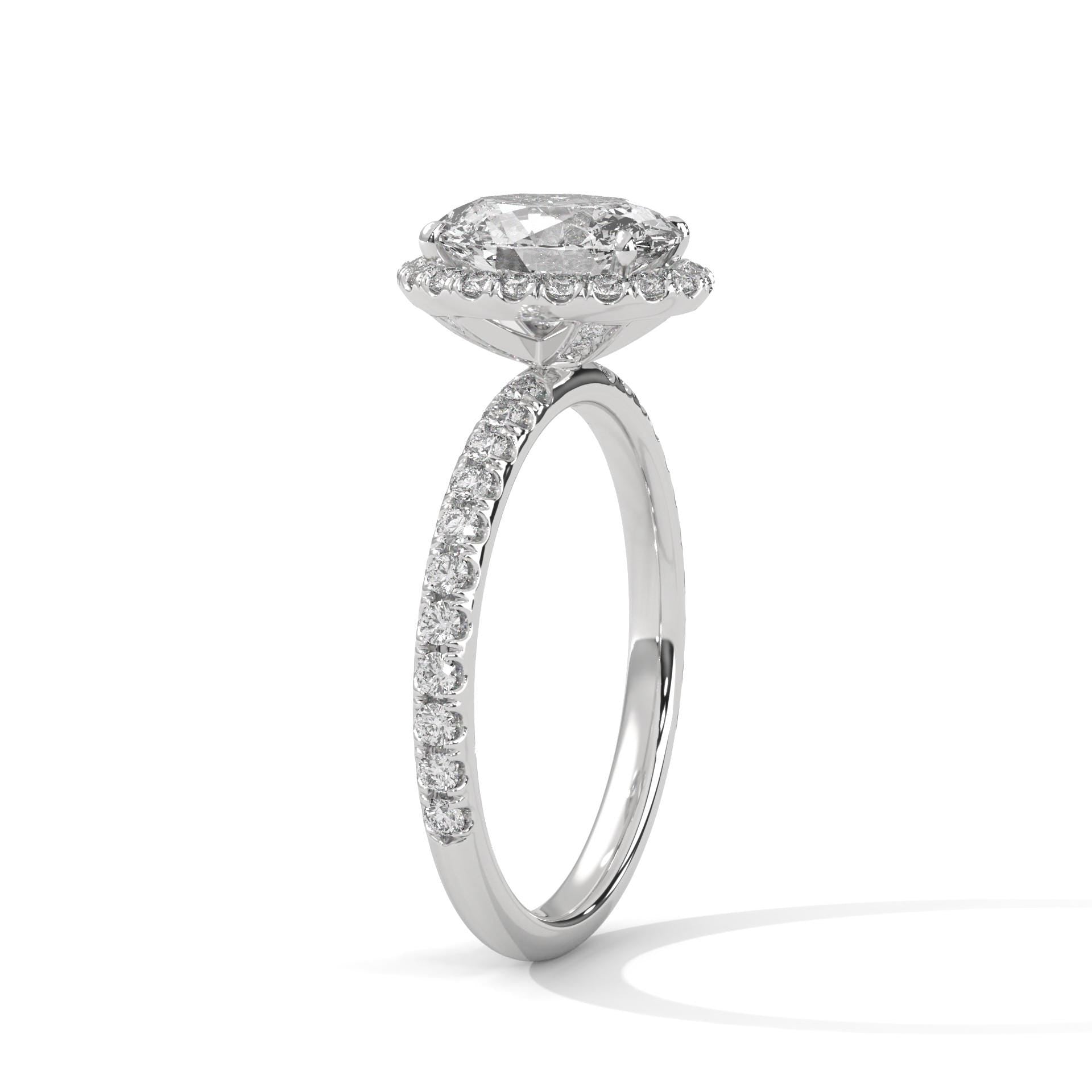 Colorless oval cut lab diamond pave halo ring in yellow gold