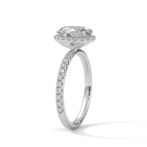 Colorless oval cut lab diamond pave halo ring in yellow gold