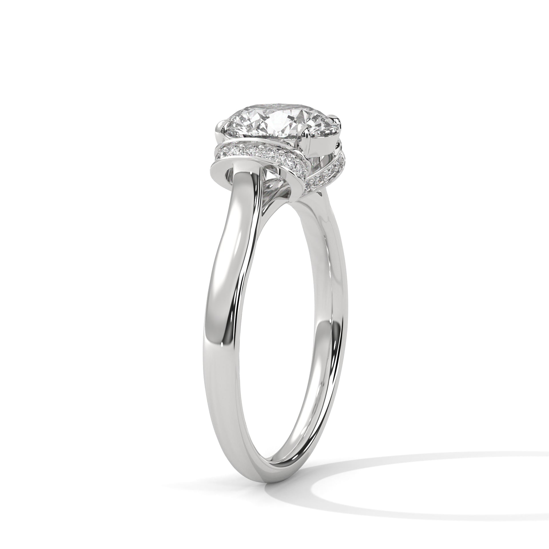 Perspective shot of a round brilliant diamond engagement ring with a hidden halo in polished white gold.