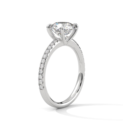 Underside view of white gold 4-prong cathedral mount for round diamond