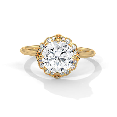 Round brilliant lab-grown diamond floral halo engagement ring in solid 14k yellow gold.