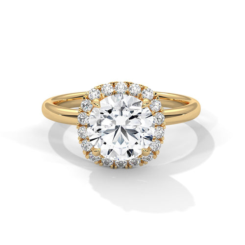 Colorless round cut lab diamond pave halo ring in yellow gold
