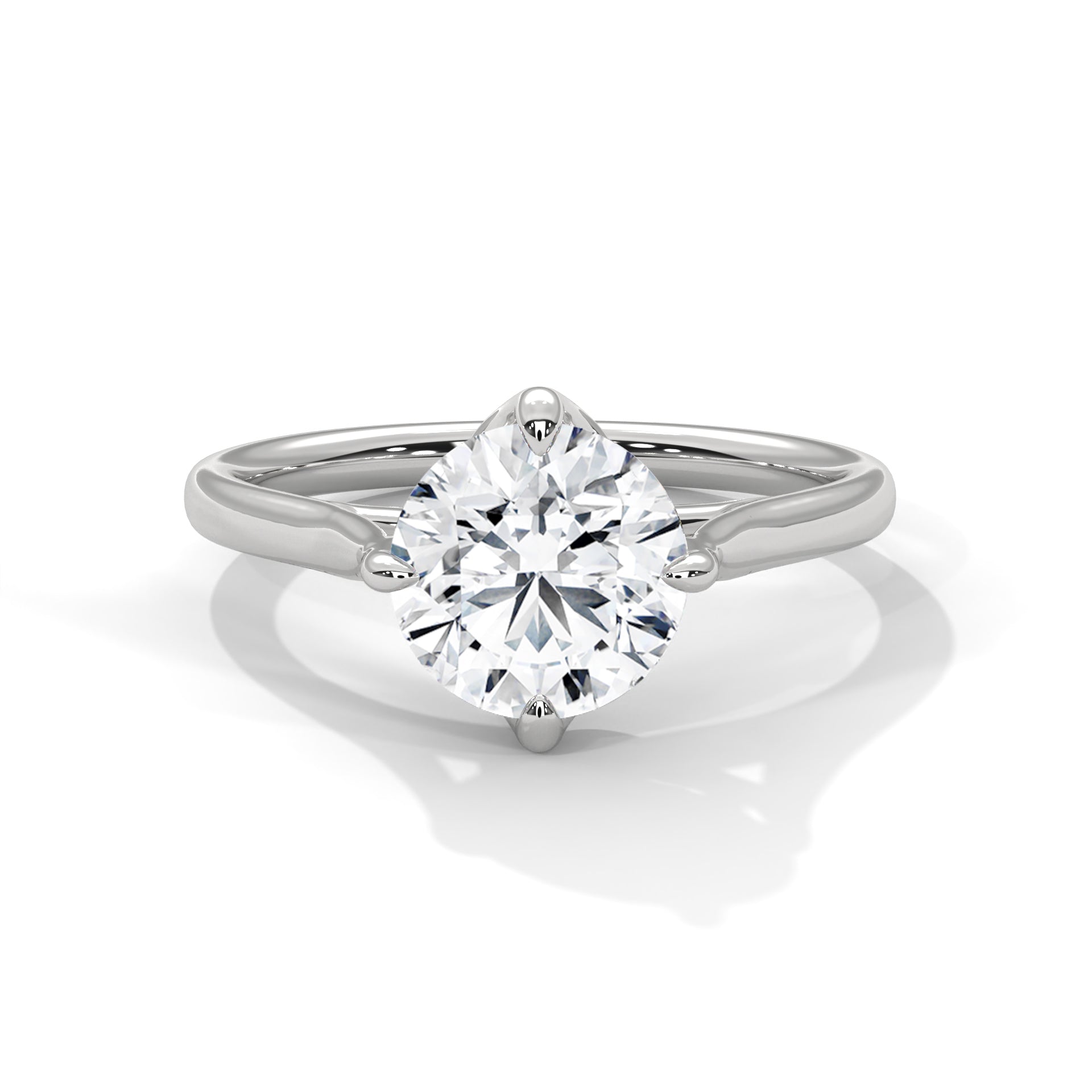 Round brilliant lab-grown diamond solitaire engagement ring in a classic six-prong white gold cathedral setting.