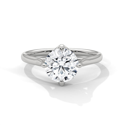 Round brilliant lab-grown diamond solitaire engagement ring in a classic six-prong white gold cathedral setting.