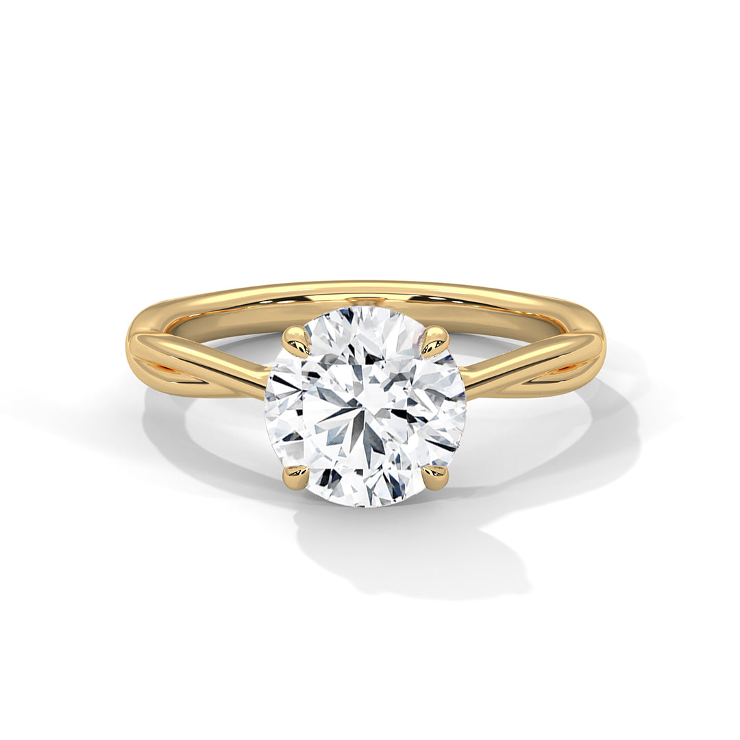 Round brilliant lab-grown diamond twisted solitaire engagement ring in solid 14k yellow gold.