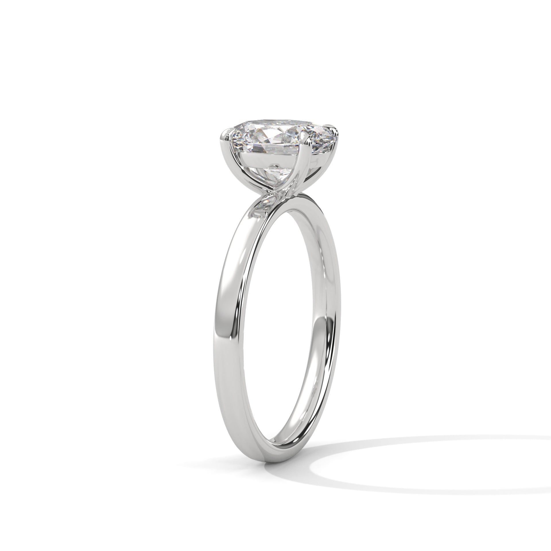 Oval solitaire plain band engagement ring in white gold, angled side view showing 4-prong setting and plain band