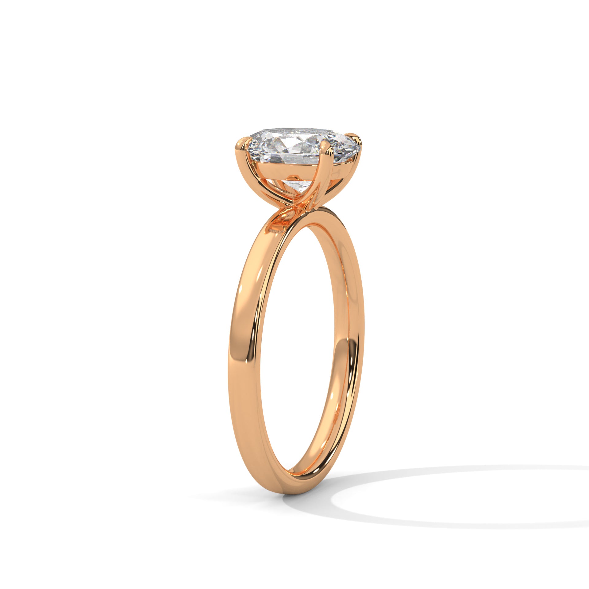 Oval solitaire plain band engagement ring in rose gold, side profile view showing plain band and prong detail