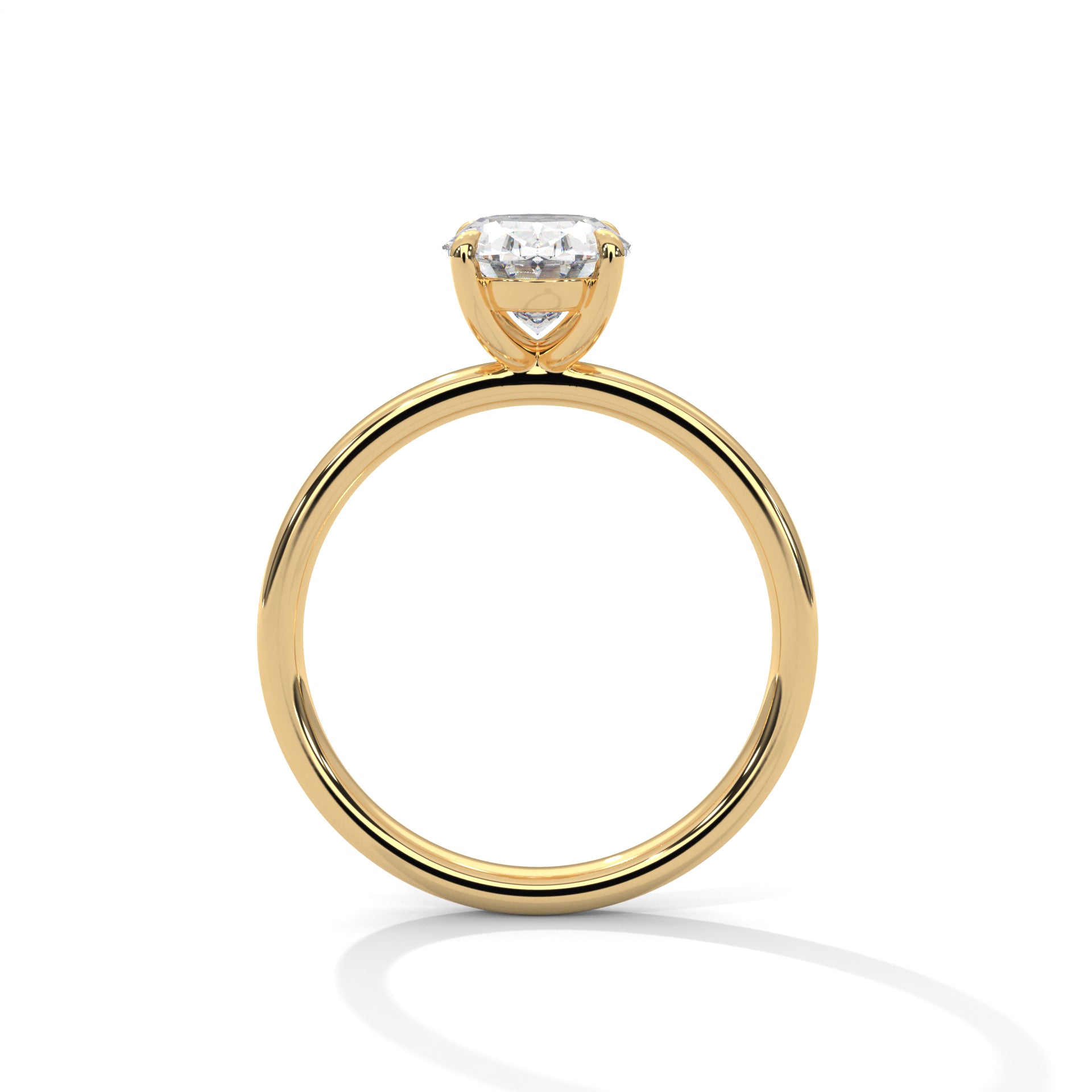 Oval solitaire plain band engagement ring in yellow gold, top view showing oval stone and smooth plain band