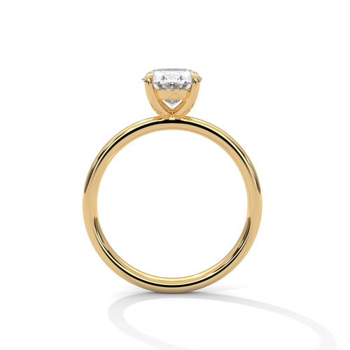 Oval solitaire plain band engagement ring in yellow gold, top view showing oval stone and smooth plain band