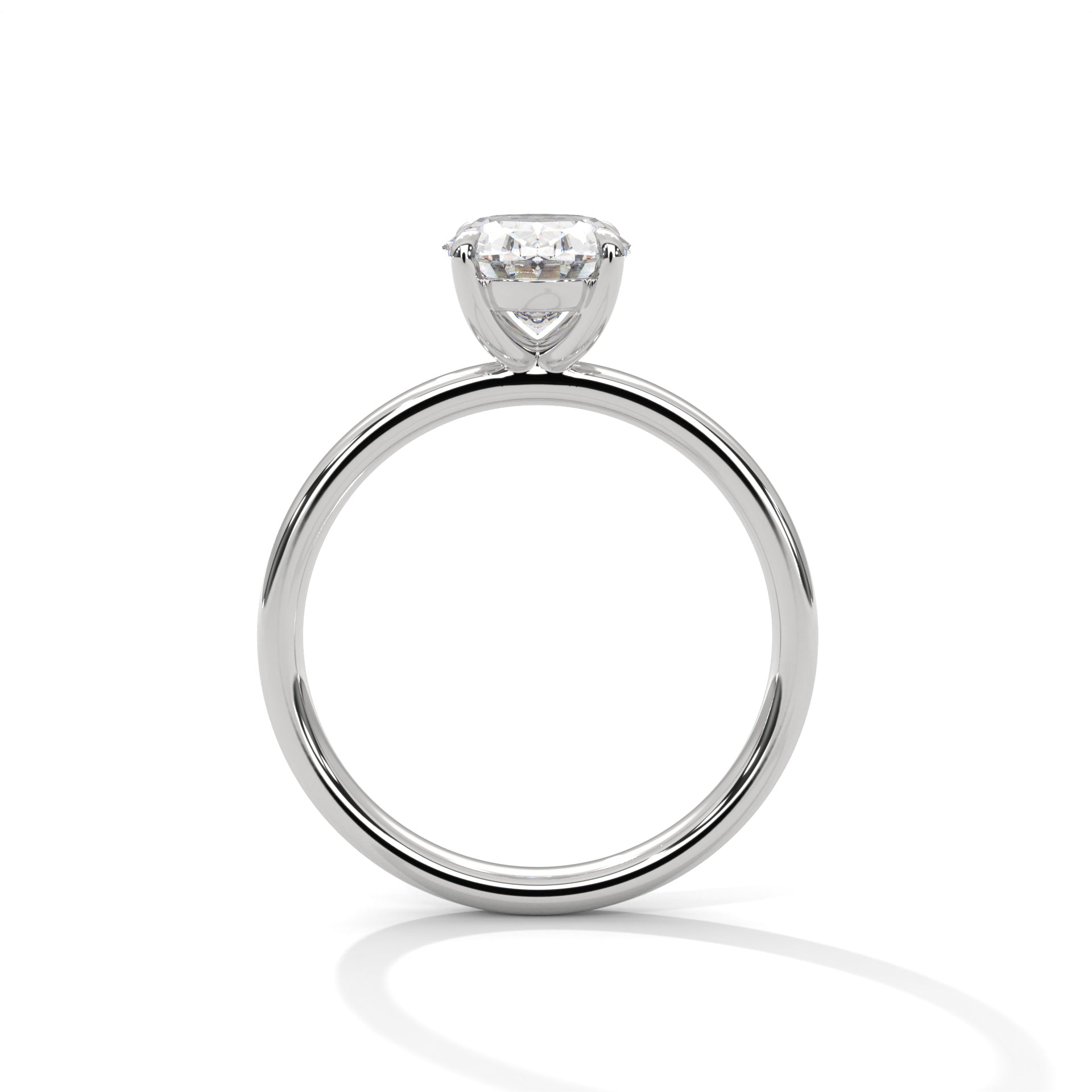 Oval solitaire plain band engagement ring in white gold, front-facing view showing oval center stone