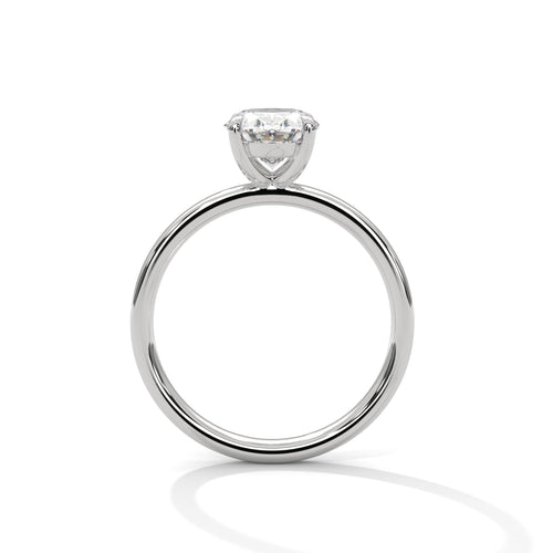 Oval solitaire plain band engagement ring in white gold, front-facing view showing oval center stone