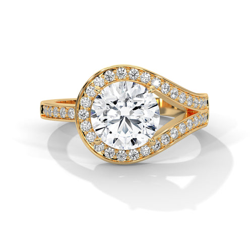 Round brilliant bypass split halo engagement ring in yellow gold, angled front view showing split halo and dual-track pavé shank