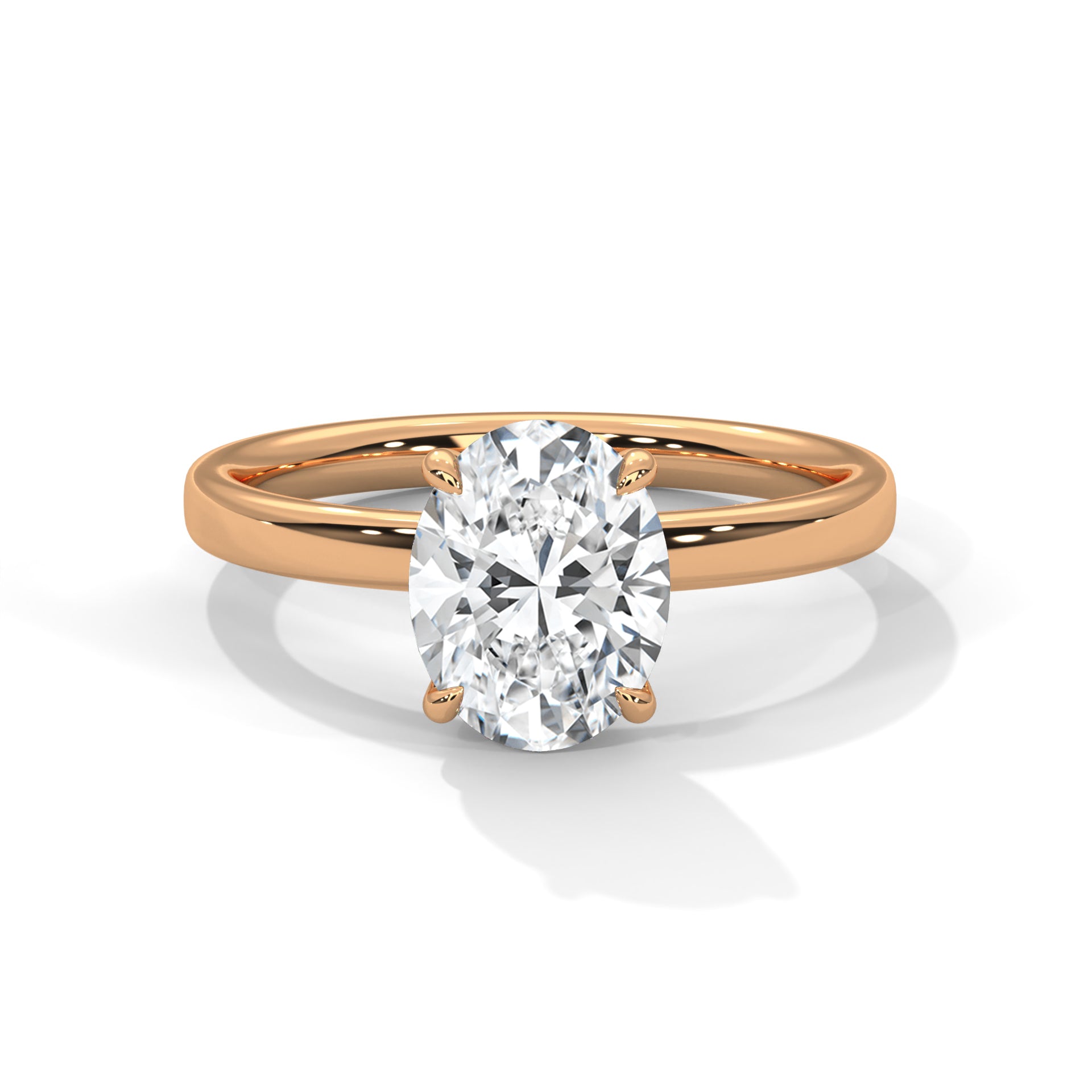 Oval solitaire plain band engagement ring in rose gold, three-quarter view showing oval center stone