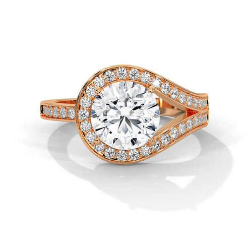 Round brilliant bypass split halo engagement ring in rose gold, three-quarter view showing halo detail and split shank