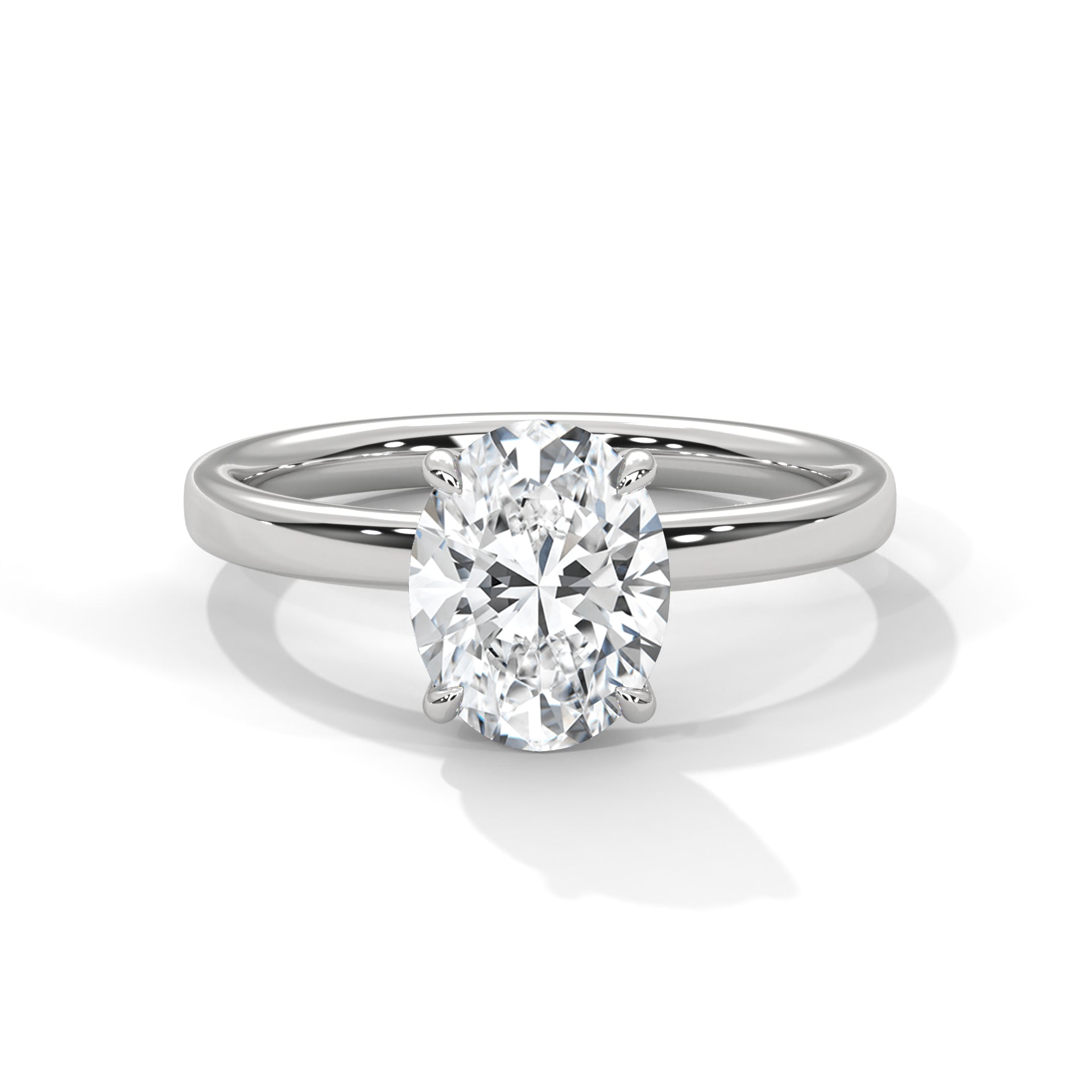 Oval solitaire plain band engagement ring in white gold, side profile view showing clean smooth band