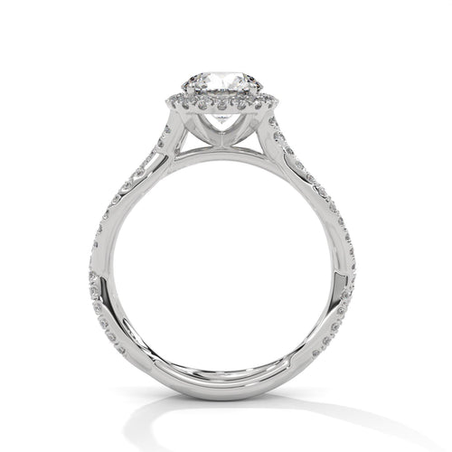 Side view of white gold round halo ring showing secure 4-prong mount.