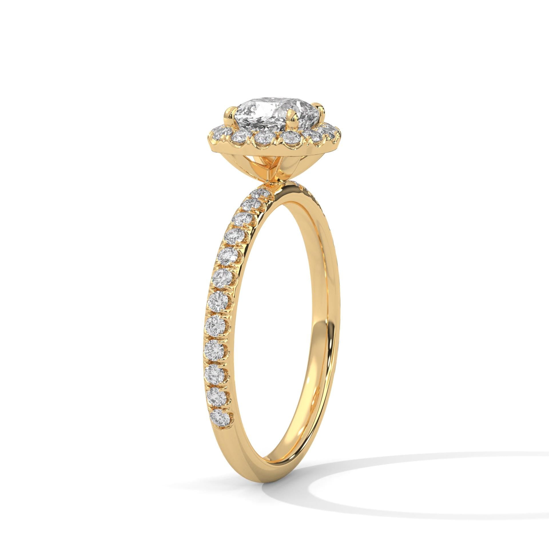 Interior view of yellow gold 4-prong halo setting for cushion brilliant diamond