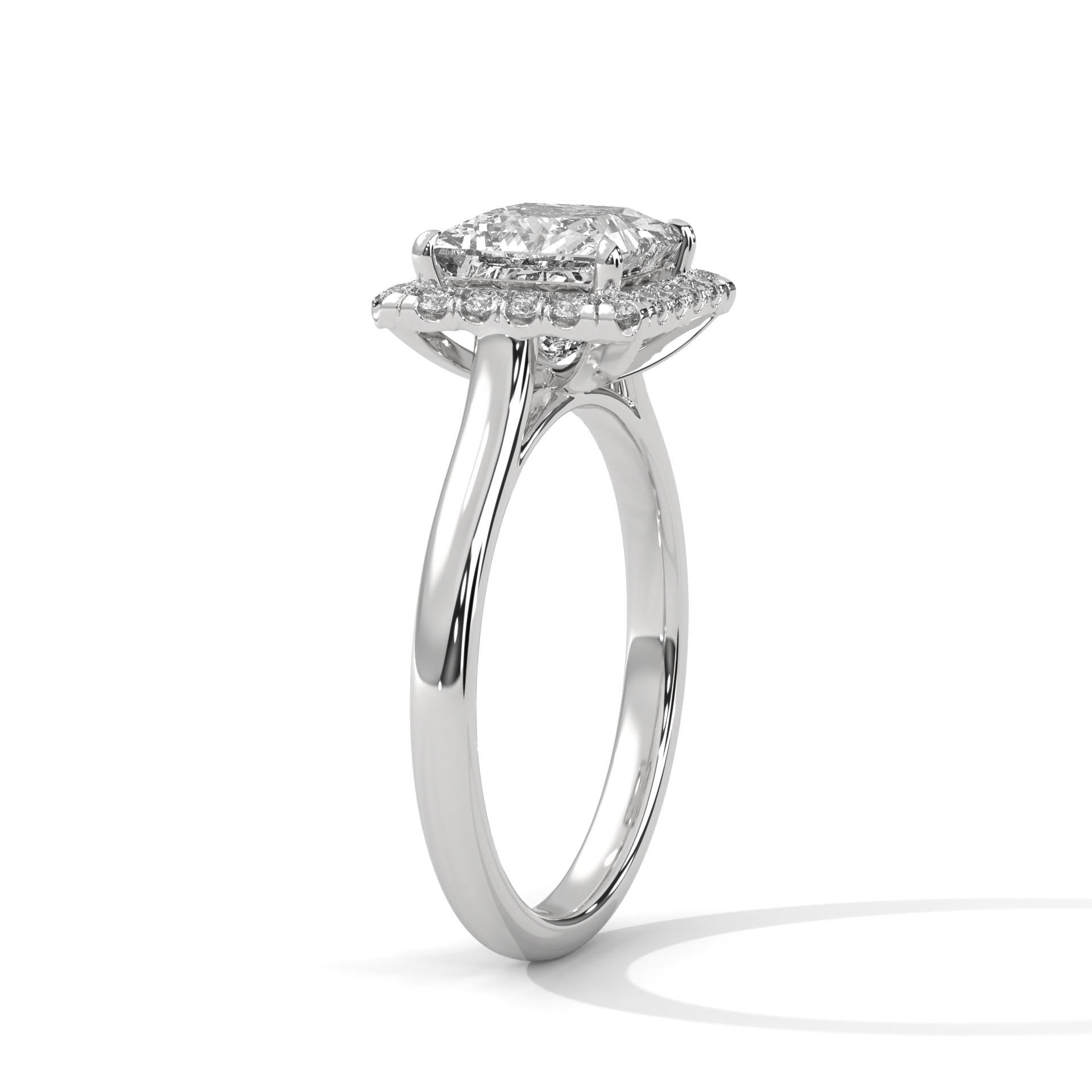 Architectural white gold 4-prong halo setting for princess cut diamond