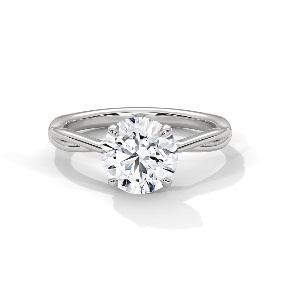 Round brilliant lab-grown diamond engagement ring featuring a twisted rope band and a polished white gold petal setting.