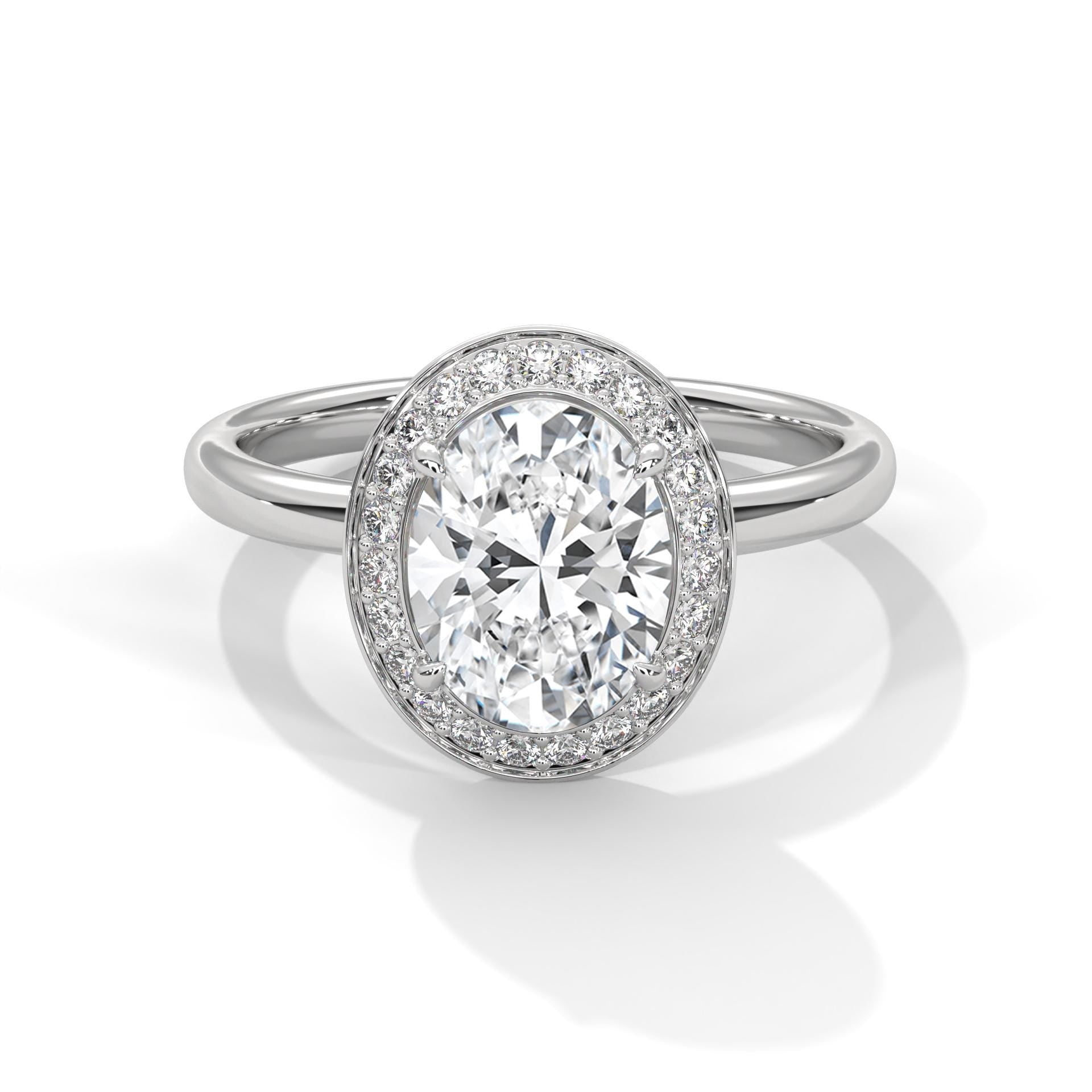 Oval cut lab grown diamond halo solitaire engagement ring in white gold