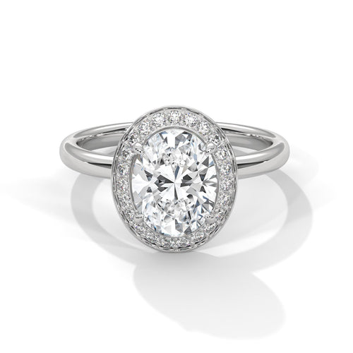 Oval cut lab grown diamond halo solitaire engagement ring in white gold