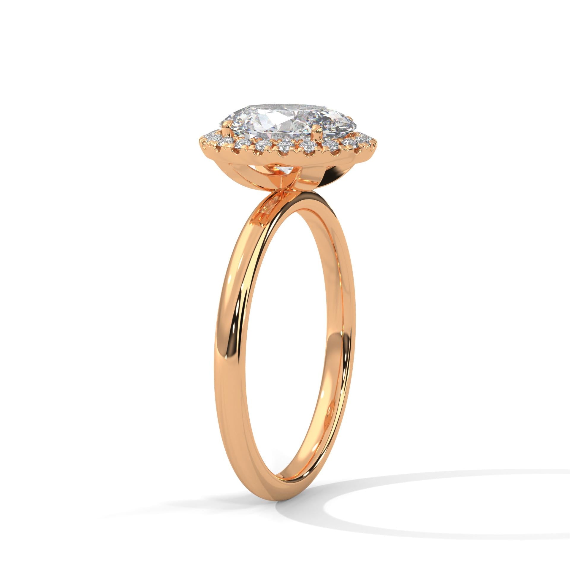 Underside view of rose gold 4-prong halo setting for oval diamond