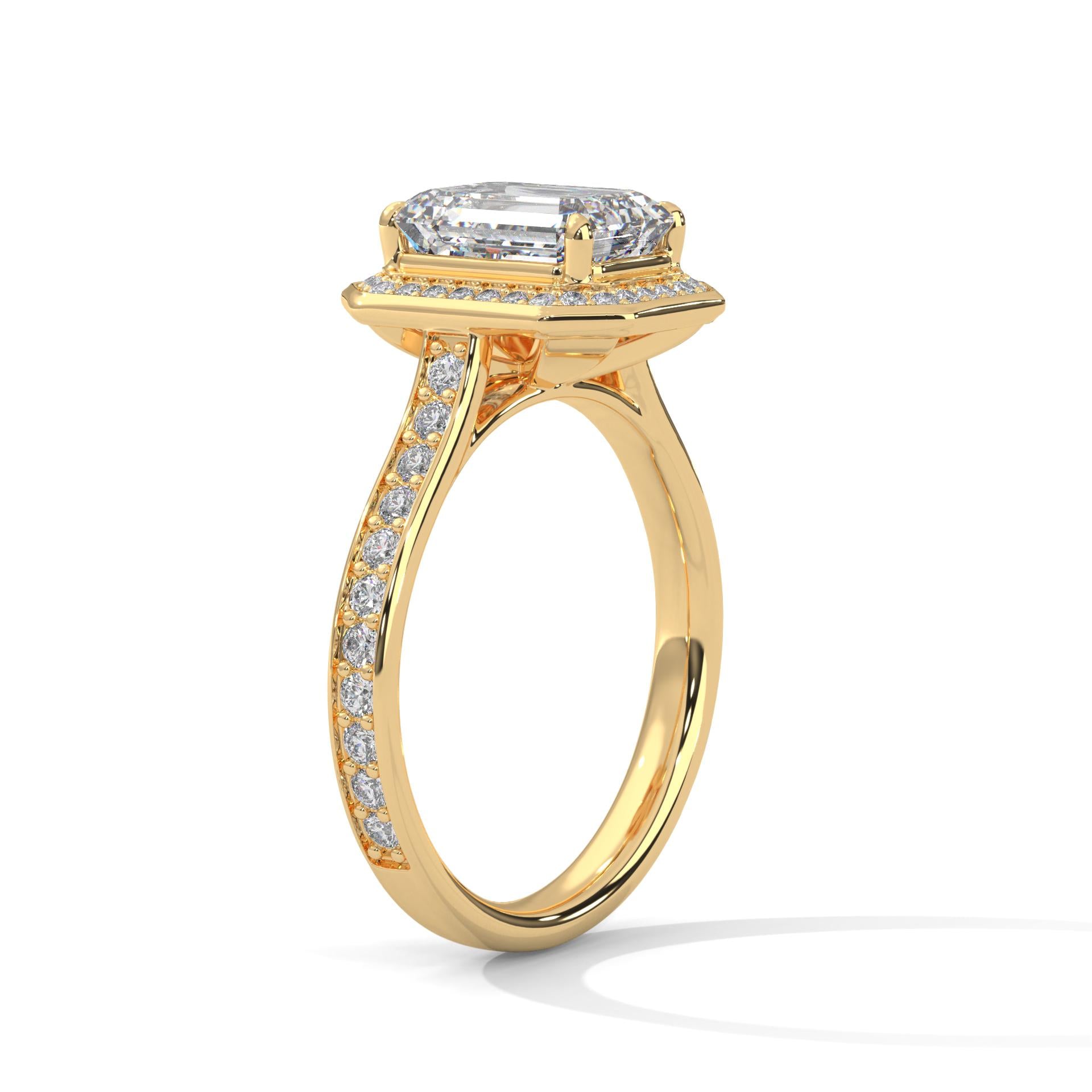 Architectural yellow gold cathedral setting for emerald cut halo diamond