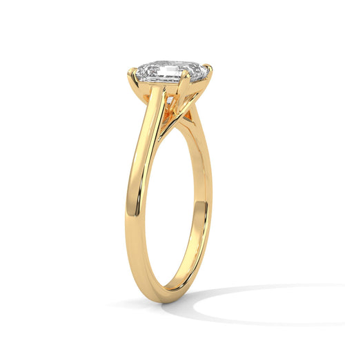 Side view of yellow gold Asscher solitaire showing light-catching prongs