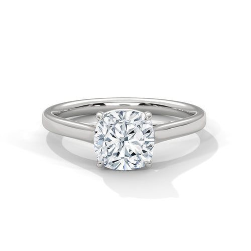 Square cushion cut lab-grown diamond solitaire engagement ring featuring an open V-gallery basket and a polished white gold knife-edge band.