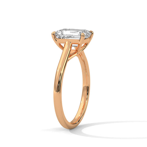 Elevated rose gold cathedral mount for emerald lab diamond solitaire