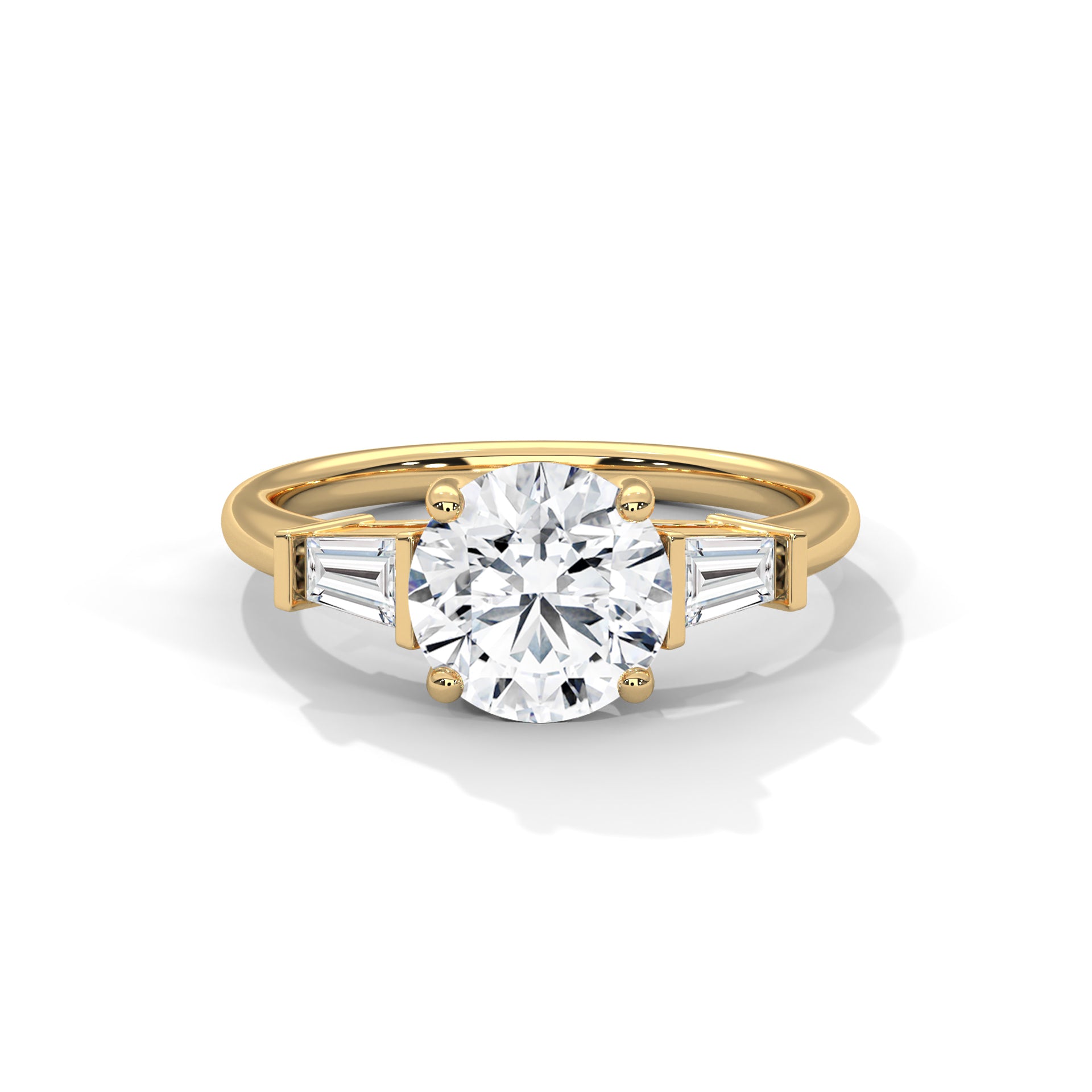 Front view of a solid yellow gold three-stone engagement ring featuring a prominent round brilliant center stone and two tapered baguette side diamonds.