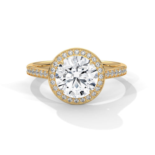 Yellow gold round halo engagement ring with micro-pave diamond shank