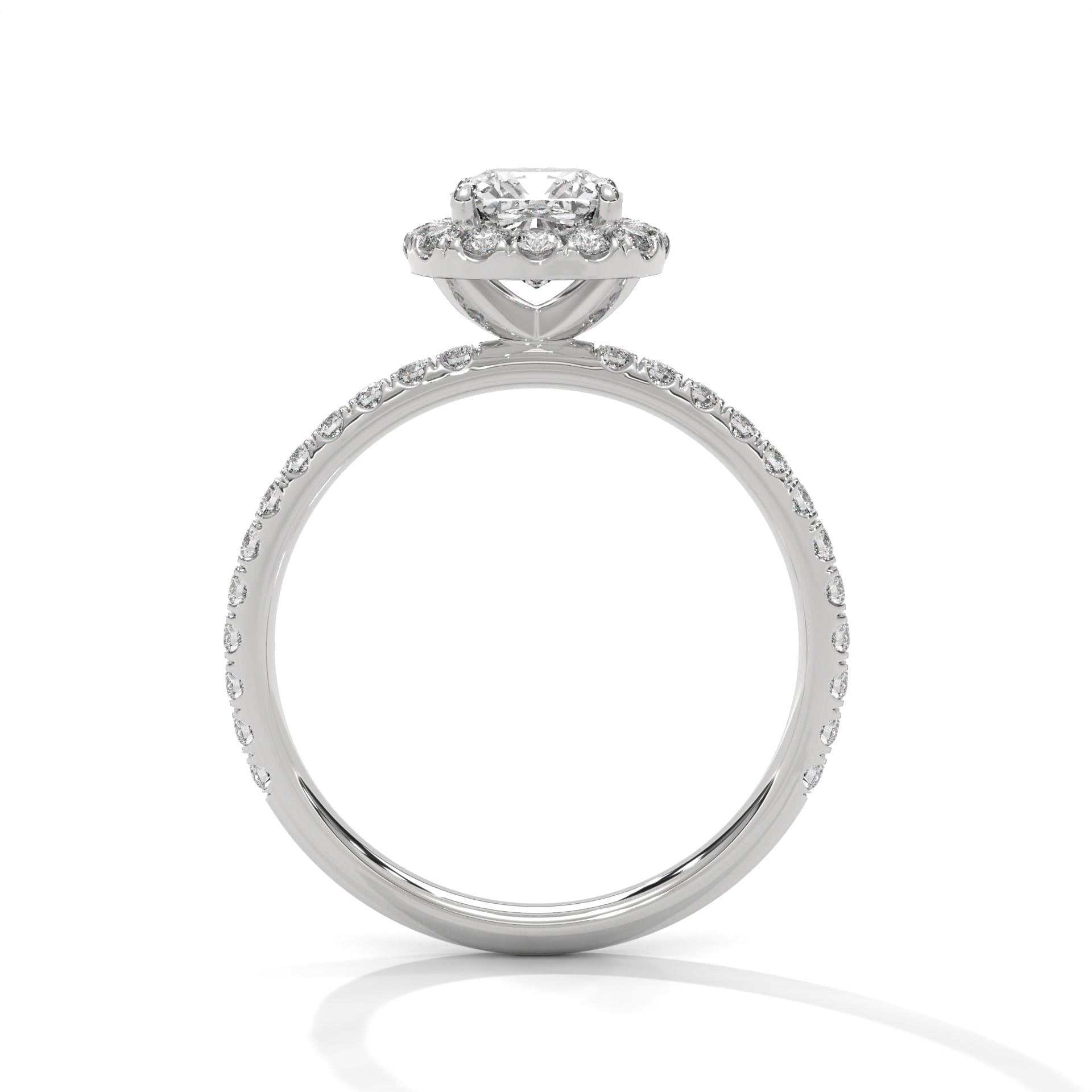 White gold cushion halo solitaire with hand-set micro-pavé diamonds