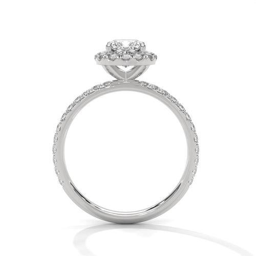 White gold cushion halo solitaire with hand-set micro-pavé diamonds