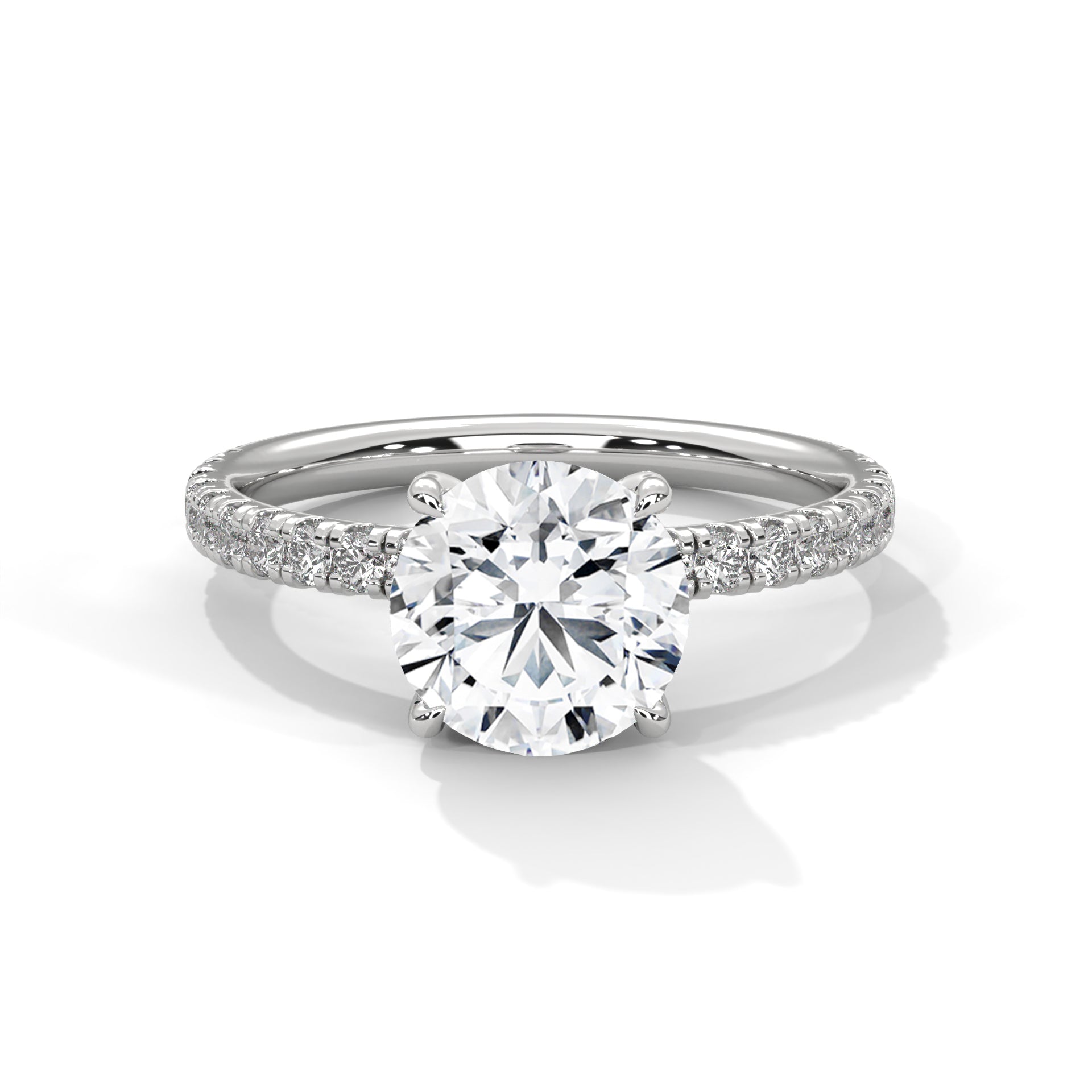 Round brilliant hidden halo pavé engagement ring in white gold, side profile view showing full band