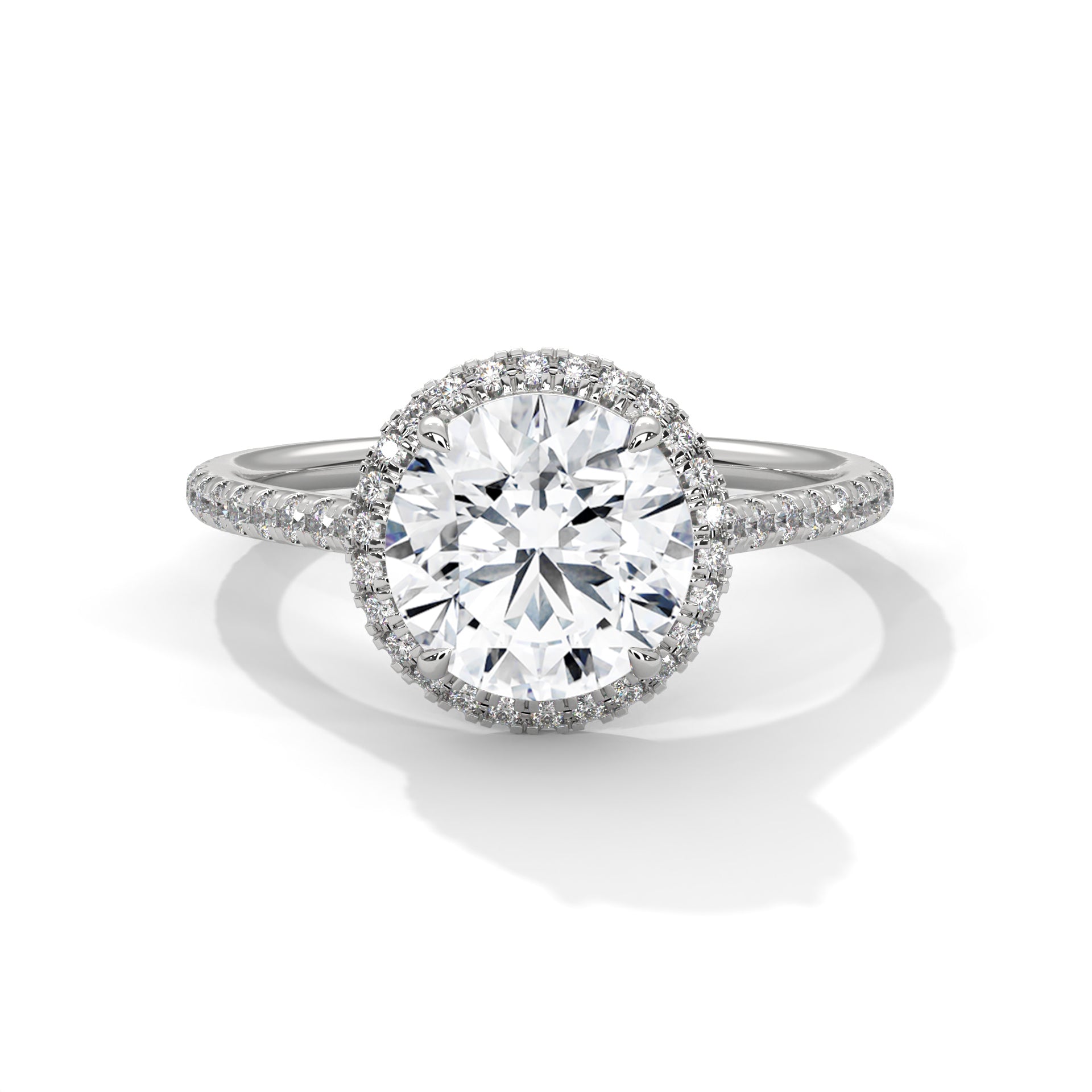 Round brilliant lab-grown diamond halo engagement ring with a pavé-set diamond band in solid white gold.