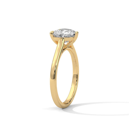 Elevated yellow gold cathedral mount for heart lab diamond solitaire