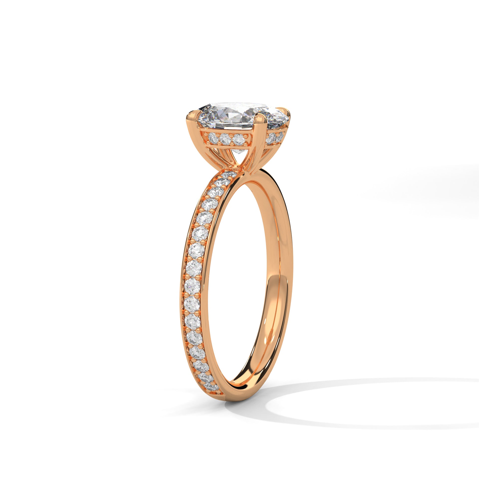 Oval hidden halo micropavé engagement ring in rose gold, side profile view showing band and crown height