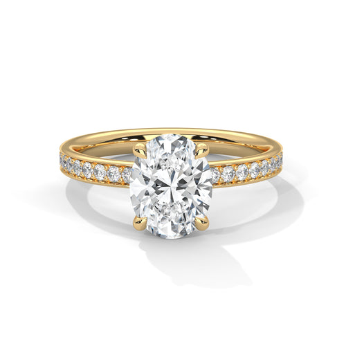 Oval hidden halo micropavé engagement ring in yellow gold, angled front view showing center stone