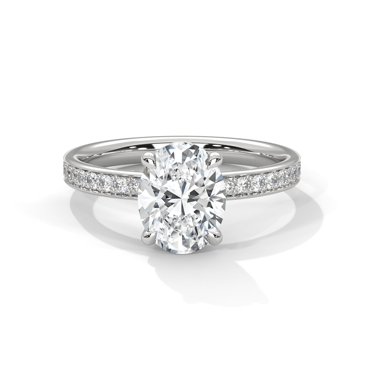 Oval hidden halo micropavé engagement ring in white gold, side profile view showing full pavé band