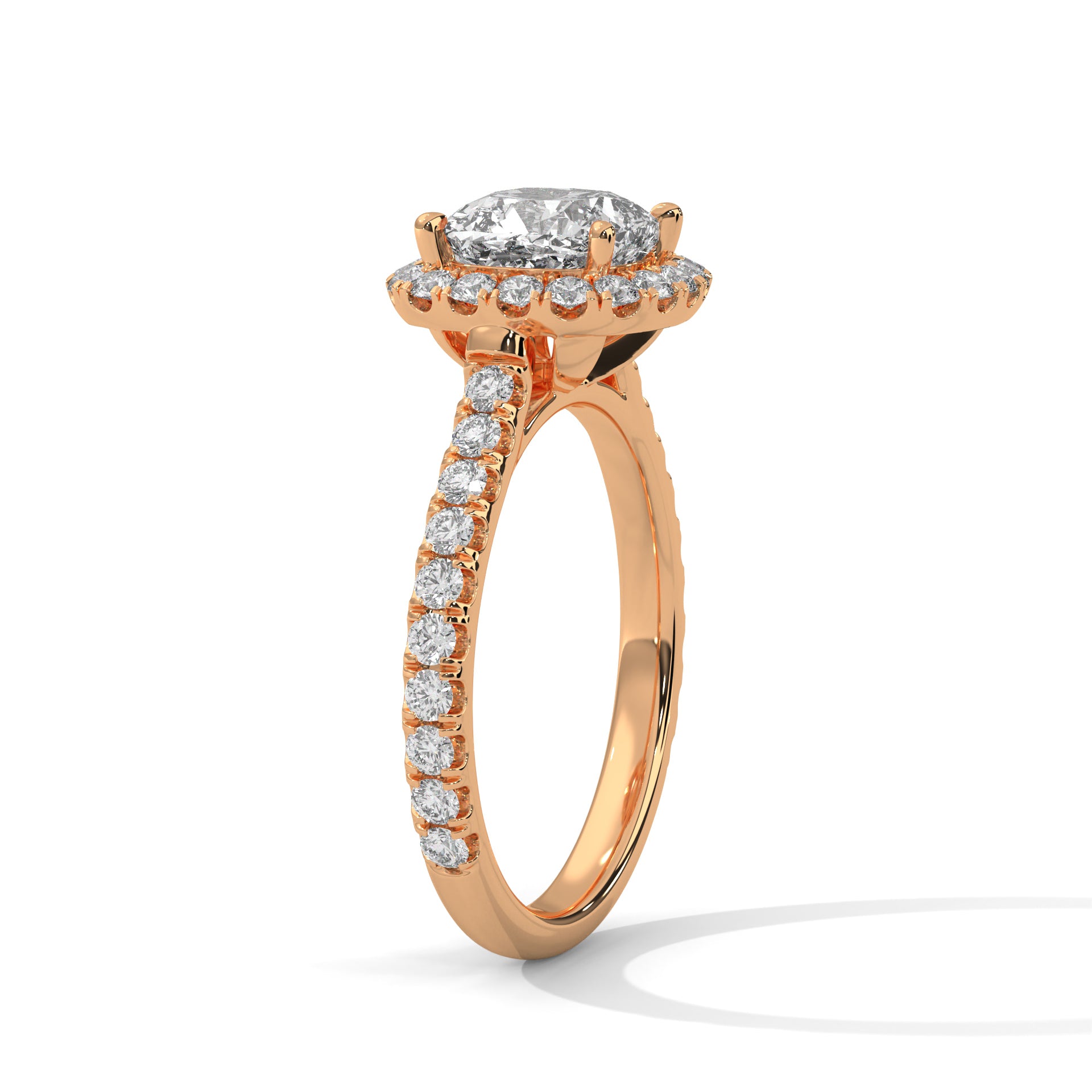 Perspective shot of a rectangular radiant diamond solitaire on a high-polish rose gold knife-edge band.