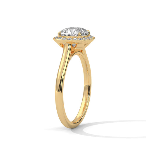 Detail view of cushion cut diamond halo in solid 18K yellow gold