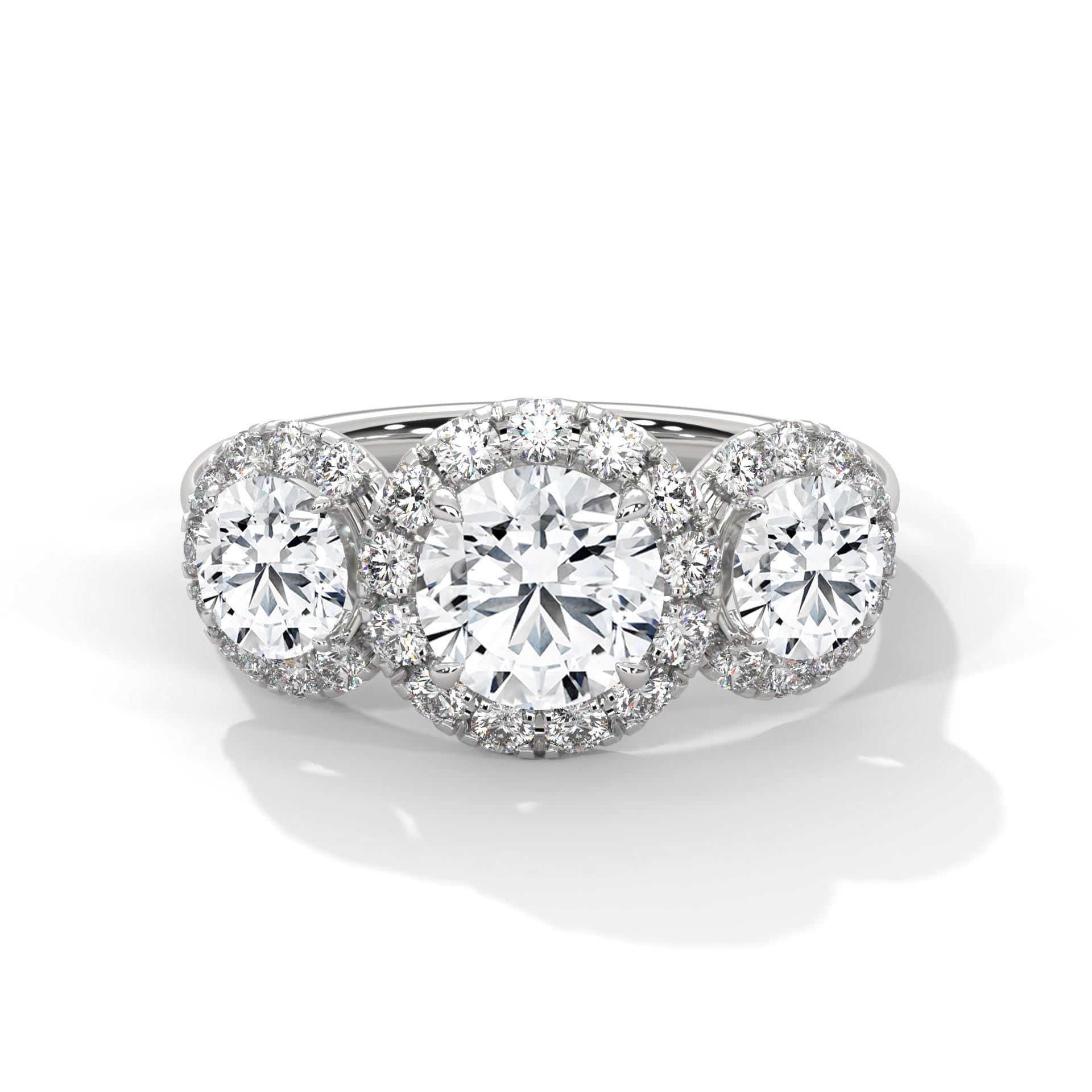 Colorless three-stone round lab diamond halo ring in white gold