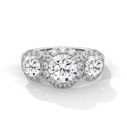 Colorless three-stone round lab diamond halo ring in white gold