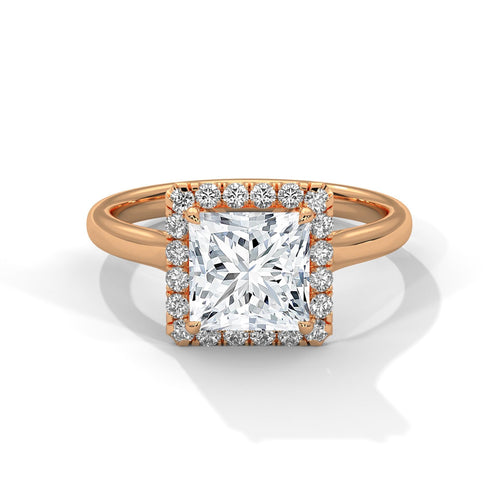 Colorless princess cut lab diamond halo ring in 18K rose gold.
