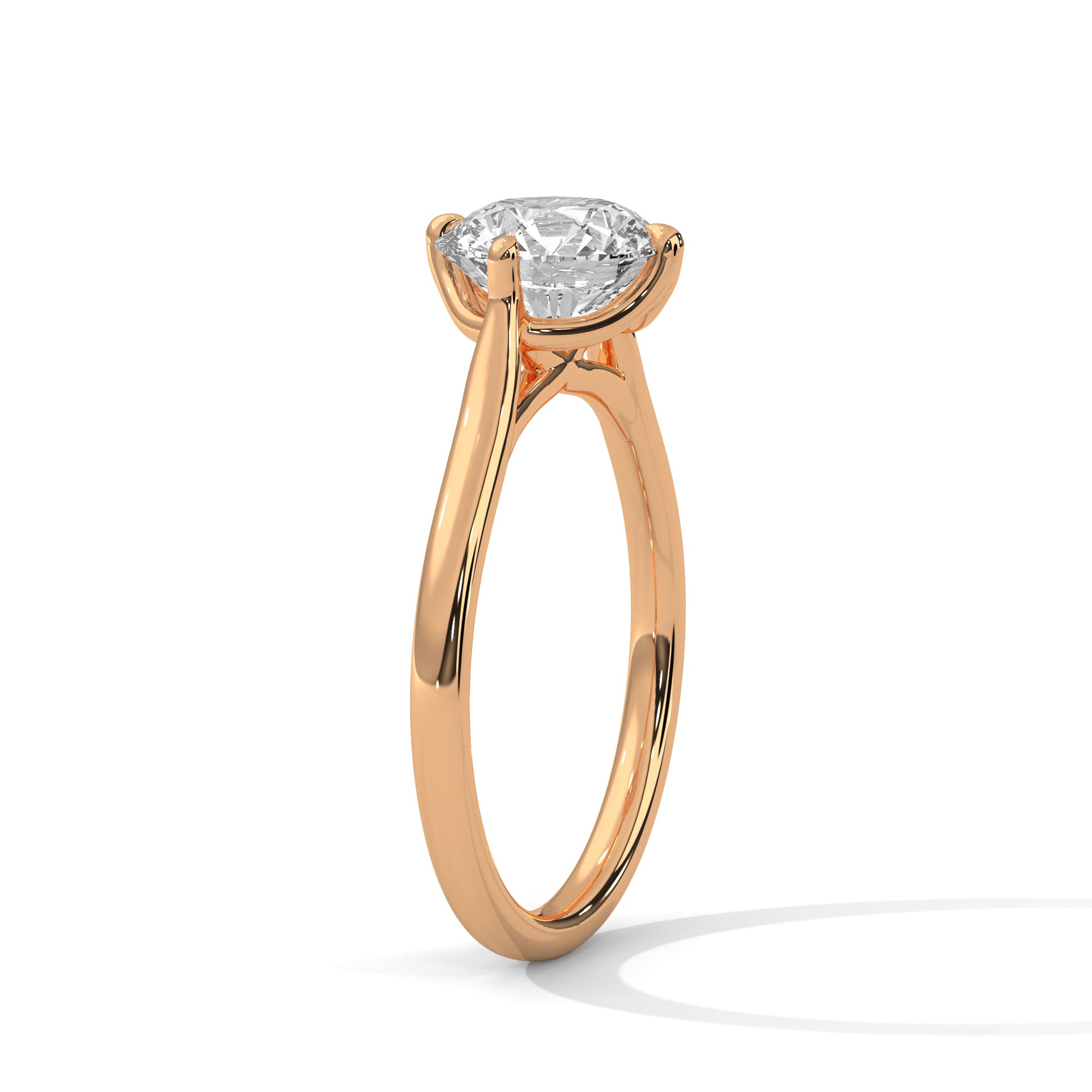 Perspective shot of a classic round diamond solitaire in rose gold.