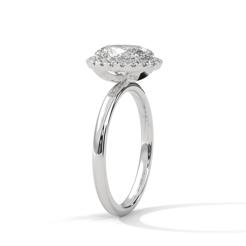 Elevated white gold 4-prong halo mount for oval brilliant diamond